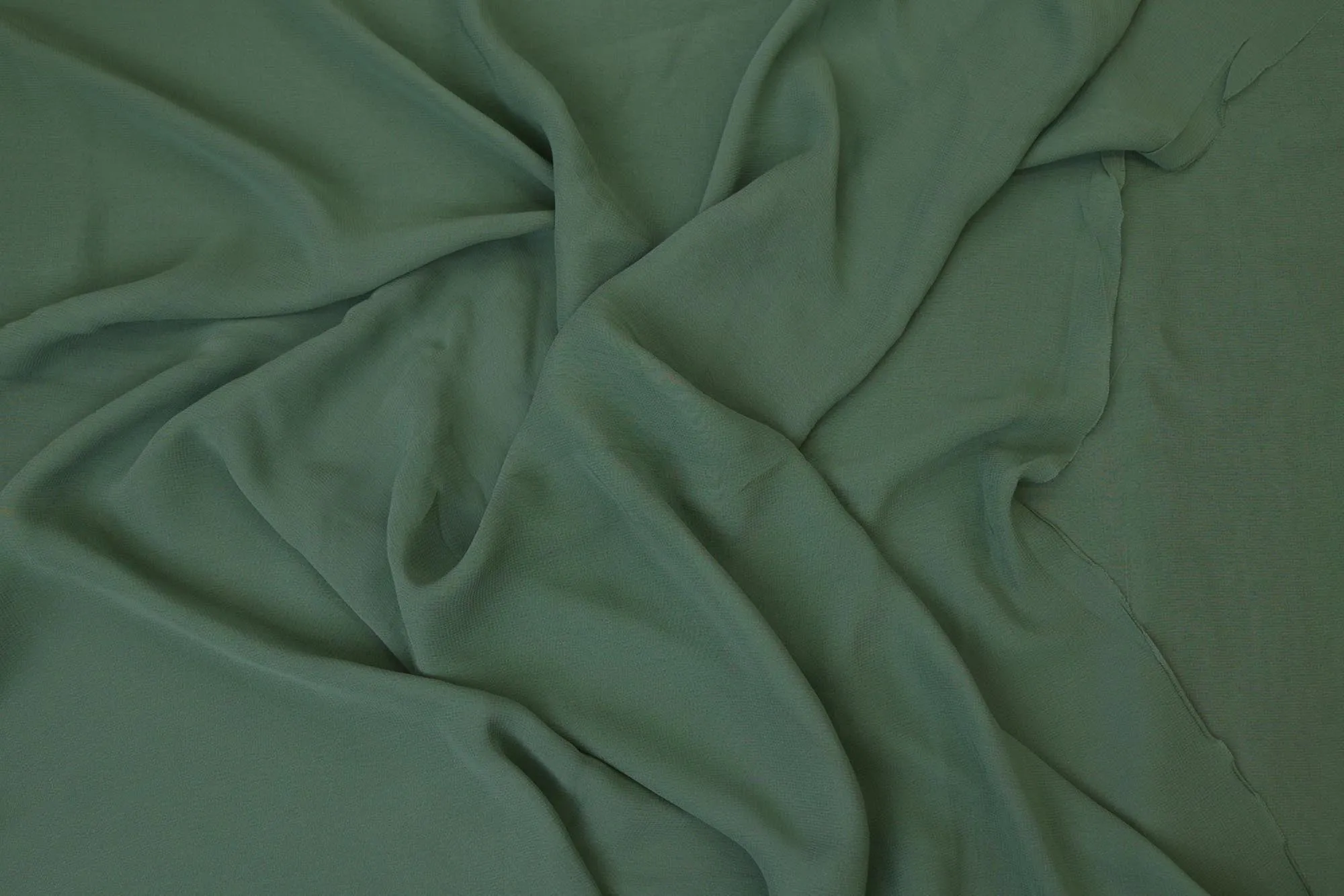 Greyish green plain georgette fabric