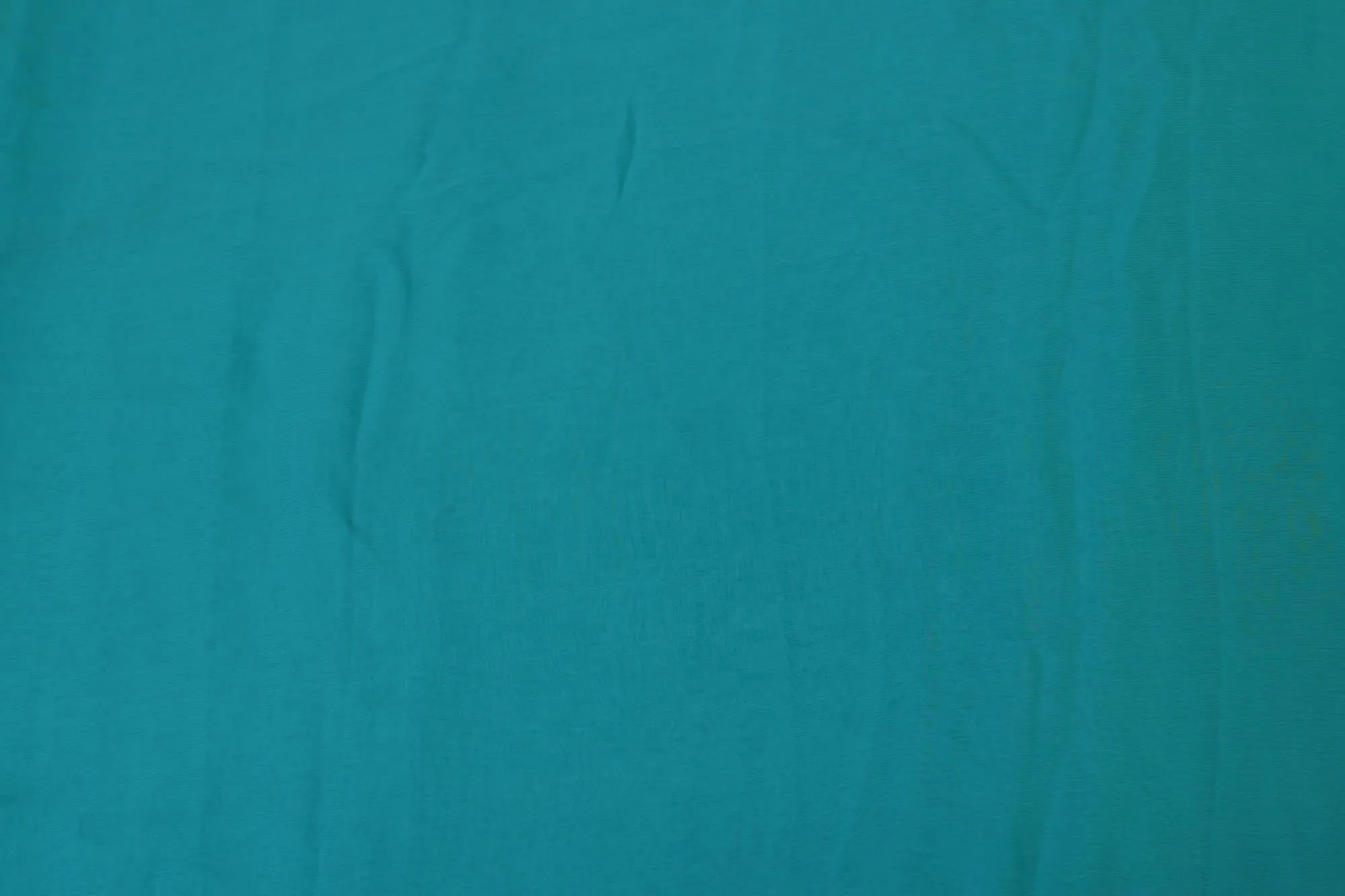 Light rama green plain georgette fabric